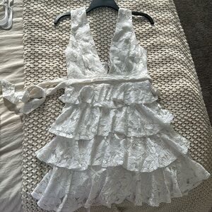 Worn once for graduation pictures. Selfie Leslie size small white lace floral